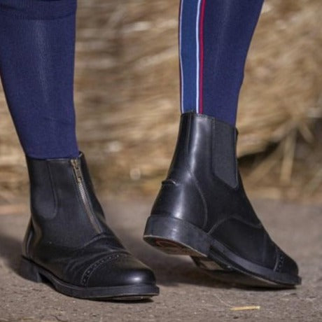 Boots d'équitation en cuir pour jeunes cavaliers Equithème Zip Cuir noires portées