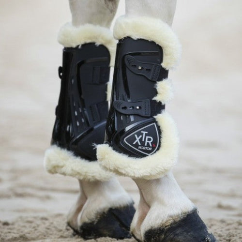 Protège-tendons doublés mouton synthétique pour poneys et chevaux Norton XTR noir